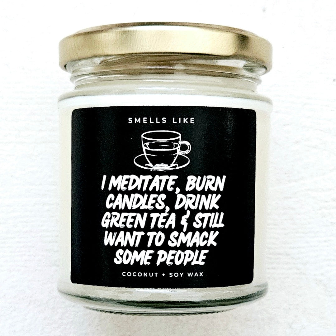 Image of White Candle on White Background, black label reads - I Meditate, Burn Candles, Drink Green Tea & Still Want To Smack Some People Candle